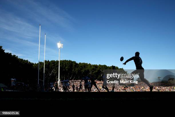 Malakai Watene-Zelezniak of the Tigers takes a pass during the round 16 NRL match between the Wests Tigers and the Gold Coast Titans at Leichhardt...