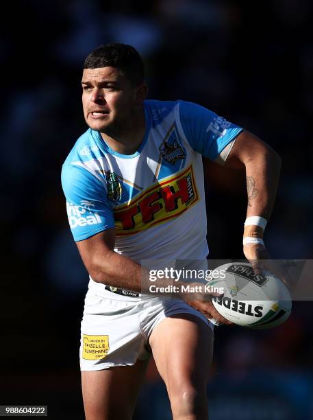 Ashley Taylor of the Titans passes during the round 16 NRL match between the Wests Tigers and the Gold Coast Titans at Leichhardt Oval on July 1,...