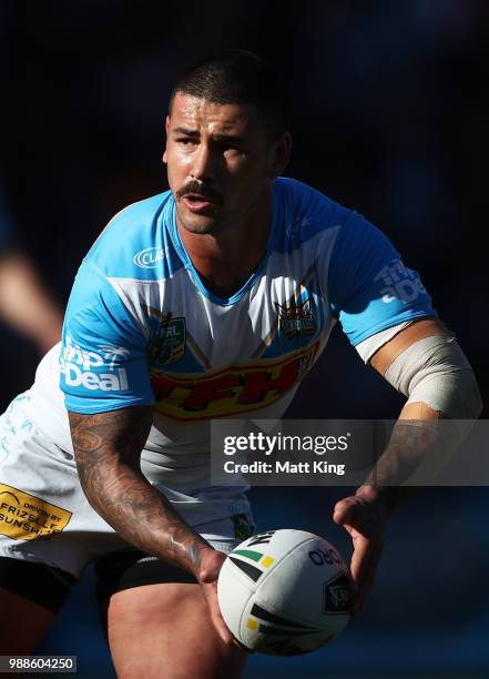 Nathan Peats of the Titans passes during the round 16 NRL match between the Wests Tigers and the Gold Coast Titans at Leichhardt Oval on July 1, 2018...
