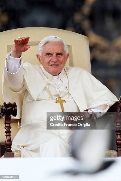 Pope Benedict XVI waves to the faithful gathered in St. Peter's Square during his weekly audience, on May 5, 2010 in Vatican City, Vatican. At the...