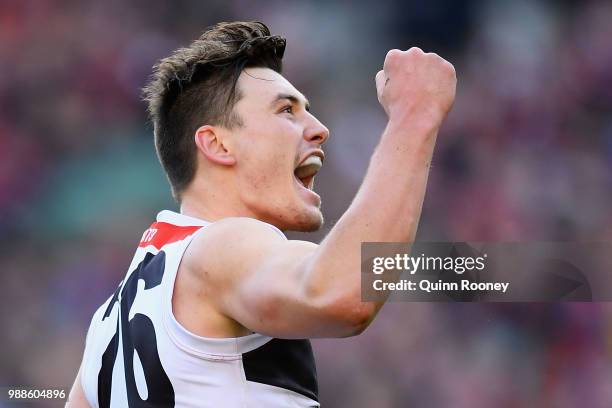 Josh Battle of the Saints celebrates kicking a goal during the round 15 AFL match between the Melbourne Demons and the St Kilda Saints at Melbourne...