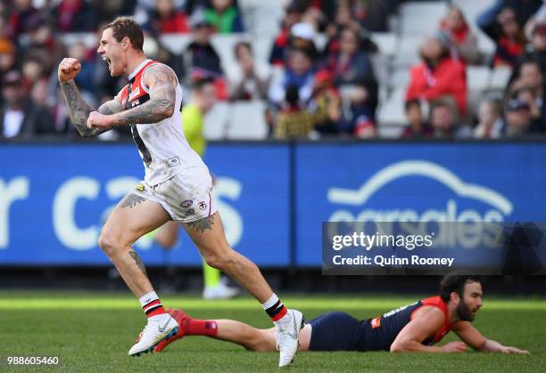 Tim Membrey of the Saints celebrates kicking a goal during the round 15 AFL match between the Melbourne Demons and the St Kilda Saints at Melbourne...