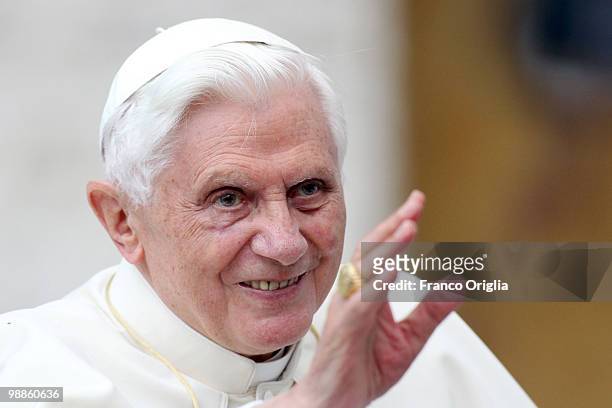 Pope Benedict XVI waves to the faithful gathered in St. Peter's Square during his weekly audience, on May 5, 2010 in Vatican City, Vatican. At the...
