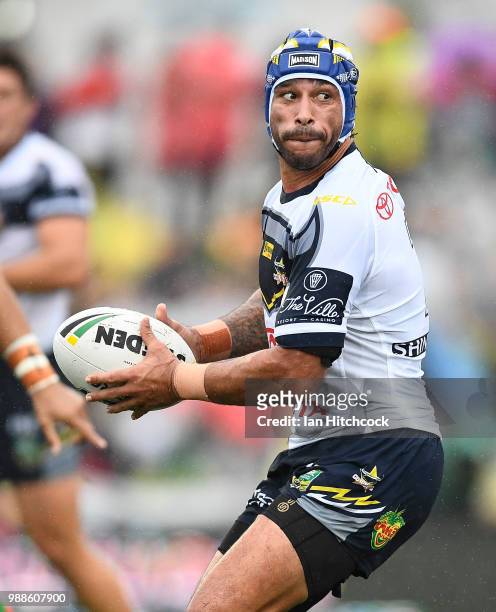 Johnathan Thurston of the Cowboys looks to pass the ball during the round 16 NRL match between the South Sydney Rabbitohs and the North Queensland...