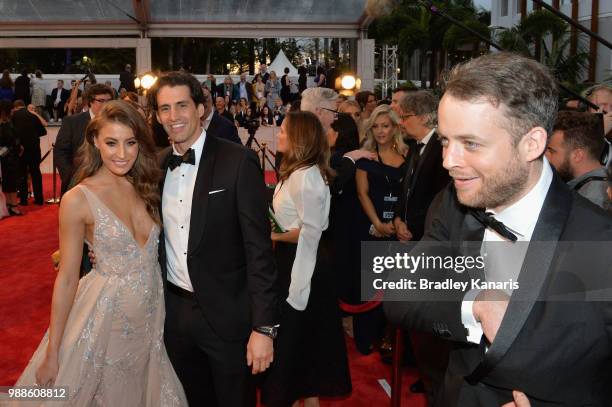 Rebecca Harding, Andy Lee and Hamish Blake arrive at the 60th Annual Logie Awards at The Star Gold Coast on July 1, 2018 in Gold Coast, Australia.