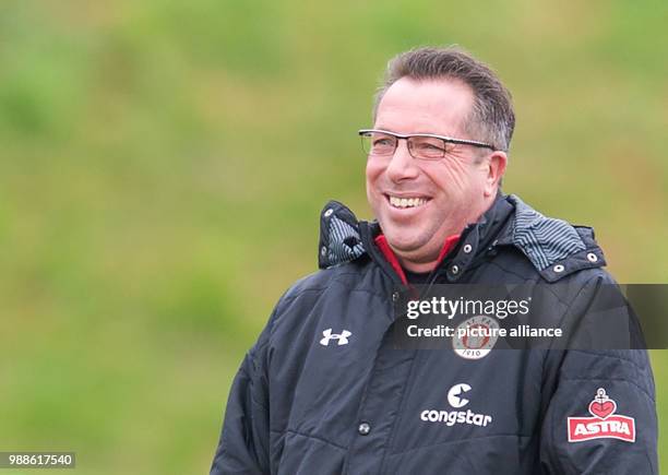 The new head coach of the German 2. Bundesliga team FC St. Pauli, Markus Kauczinski, watches his first training session with the team in Hamburg,...