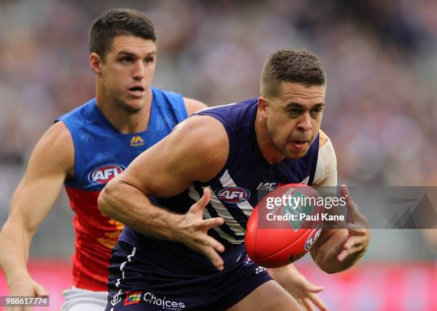 Stephen Hill of the Dockers juggles a mark during the round 15 AFL match between the Fremantle Dockers and the Brisbane Lions at Optus Stadium on...