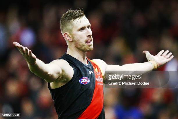 Shaun McKernan of Essendon celebrates a goal during the round 15 AFL match between the Essendon Bombers and the North Melbourne Kangaroos at Etihad...
