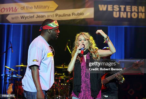 Paulina Rubio and Wyclef Jean perform at Western Union's "Return the Love" campaign and concert to honor moms of the military a week before Mother's...