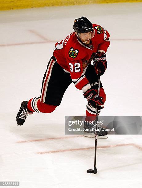 Kris Versteeg of the Chicago Blackhawks prepares to shoot the game-winning goal against the Vancouver Canucks in Game Two of the Western Conference...