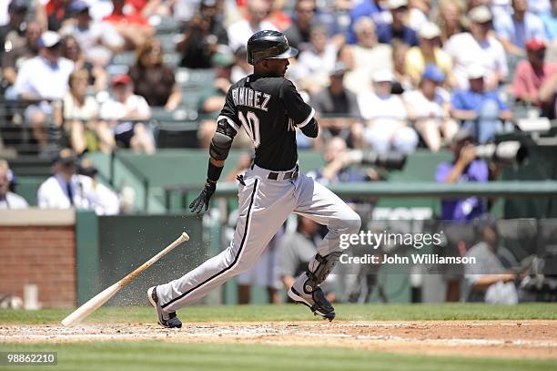 Alexei Ramirez of the Chicago White Sox bats and runs to first base from the batter's box during the game against the Texas Rangers at Rangers...