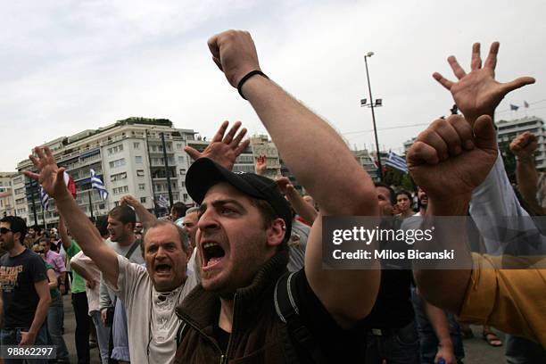 Protesters outside parliament on May 5, 2010 in Athens, Greece. Three people have died after protesters set fire to the Marfin Egnatia Bank in...