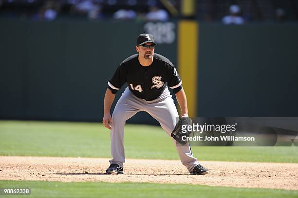 First baseman Paul Konerko of the Chicago White Sox looks to home plate for the pitch from his position in the field during the game against the...