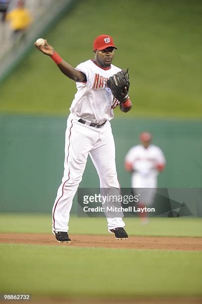 Christian Guzman of the Washington Nationals throws during a baseball game against the Atlanta Braves on May 4, 2010 at Nationals Park in Washington,...