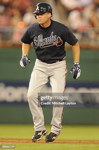 Chipper Jones of the Atlanta Braves leads off first base during a baseball game against the Washington Nationals on May 4, 2010 at Nationals Park in...