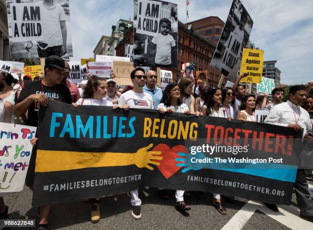 Lin-Manuel Miranda, marches during the Families Belong Together march, in Washington, DC, June 30, 2018.