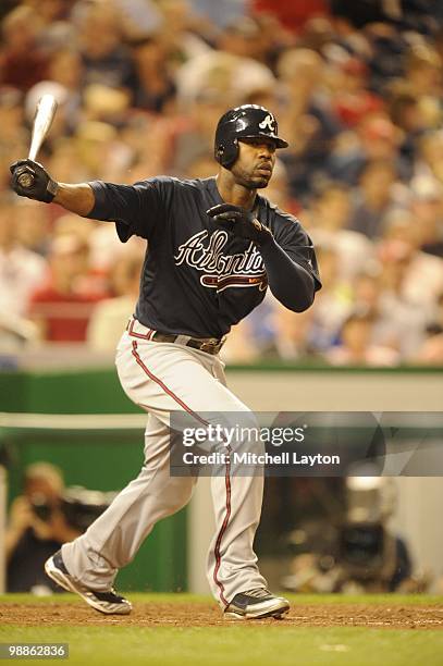 Jason Heyward of the Atlanta Braves takes a swing during a baseball game against the Washington Nationals on May 4, 2010 at Nationals Park in...