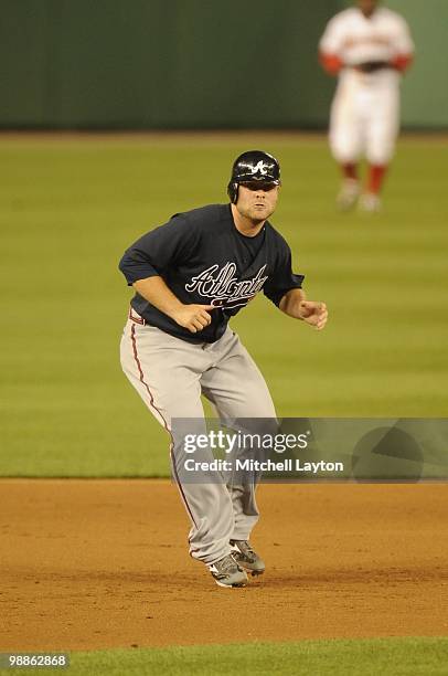 Brian McCann of the Atlanta Braves leads off second base during a baseball game against the Washington Nationals on May 4, 2010 at Nationals Park in...