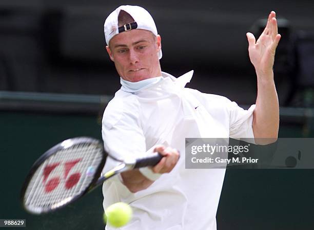 Lleyton Hewitt of Australia in action against Younes El Aynaoui of Morocco during the men's third round of The All England Lawn Tennis Championship...