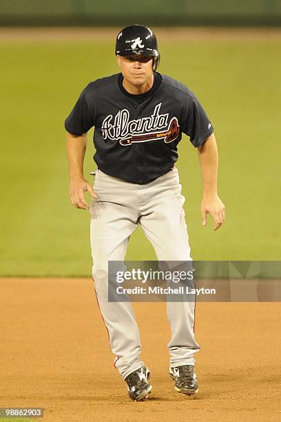 Chipper Jones of the Atlanta Braves leads off first base during a baseball game against the Washington Nationals on May 4, 2010 at Nationals Park in...