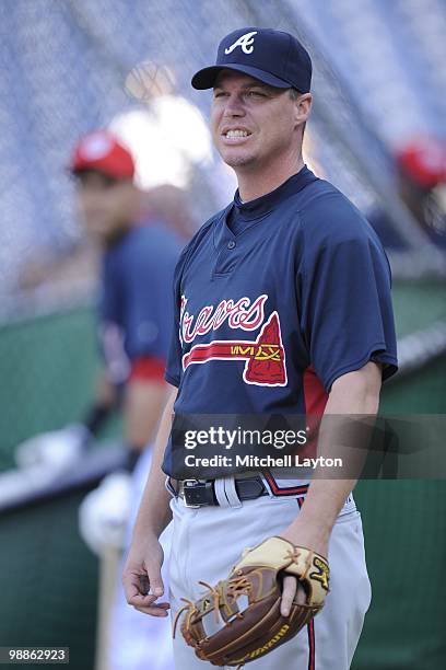 Chipper Jones of the Atlanta Braves looks on before a baseball game against the Washington Nationals on May 4, 2010 at Nationals Park in Washington,...