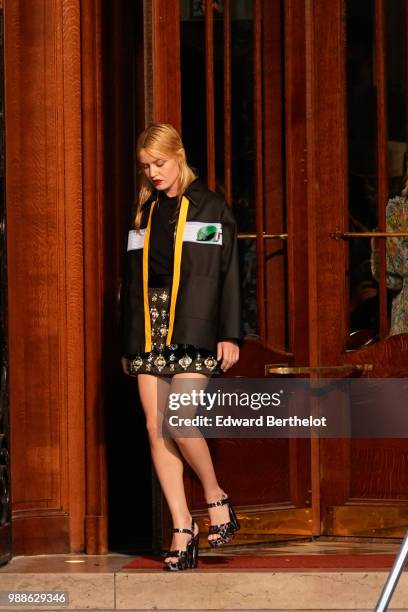Georgia May Jagger walks the runway, outside the Miu Miu Cruise Collection show, outside the Hotel Regina, in Paris, on June 30, 2018 in Paris,...