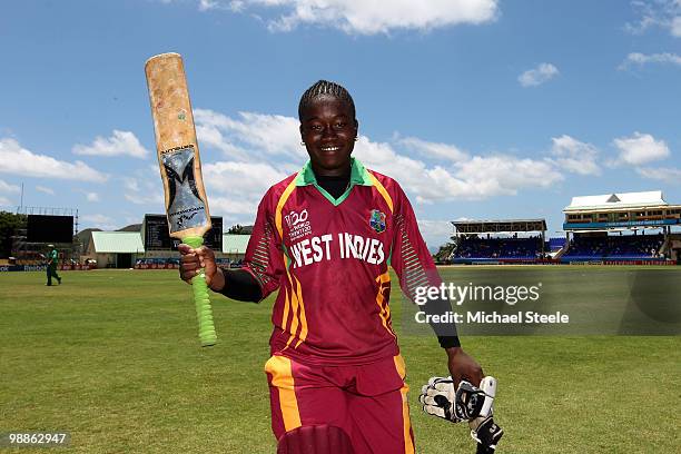 Deandra Dottin of West Indies celebrates her unbeaten 112 during the ICC T20 Women's World Cup Group A match between West Indies and South Africa at...