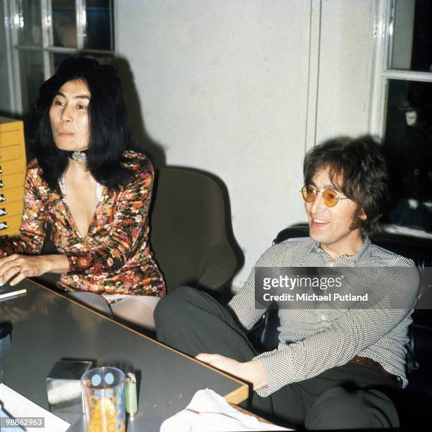 John Lennon and Yoko Ono being interviewed by journalist Steve Turner of Beat Instrumental magazine, Apple Records, London, 19th July 1971.