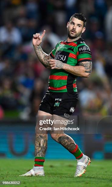 Adam Reynolds of the Rabbitohs celebrates after kicking the winning field goal during the round 16 NRL match between the South Sydney Rabbitohs and...