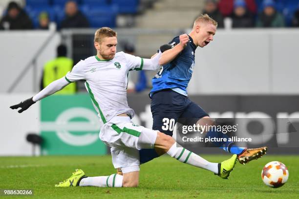 Hoffenheim's Philipp Ochs and Razgrad's Igor Plastun in action during the Europa League group C soccer match between 1899 Hoffenheim and Ludogorets...