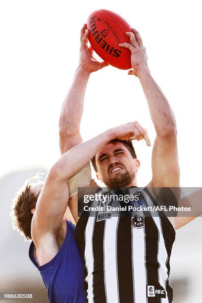 Michael Chippendale of the Magpies marks the ball during the round 13 VFL match between Williamstown and Collingwood at Williamstown Football Ground...