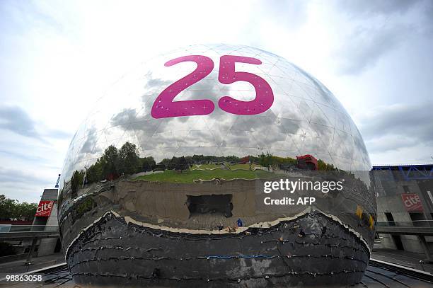 Giant number 25 is pictured on the Geode, an Omnimax theatre, on May 5, 2010 in the Parc de la Villette at the Cite des Sciences et de l'Industrie,...