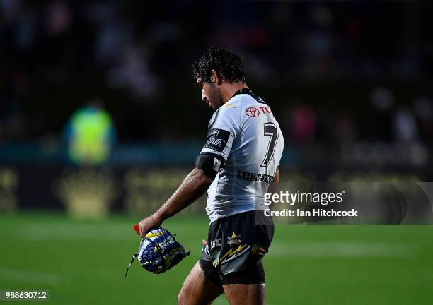 Johnathan Thurston of the Cowboys walks from the field looking dejected after losing the round 16 NRL match between the South Sydney Rabbitohs and...