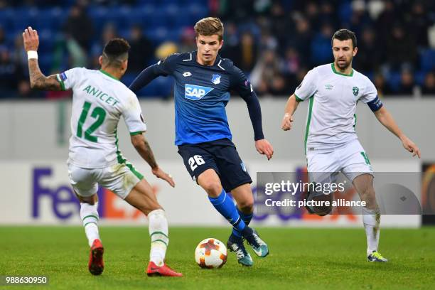 Hoffenheim's David Otto and Razgrad's Anicet Abel and Svetoslav Dyakov in action during the Europa League group C soccer match between 1899...