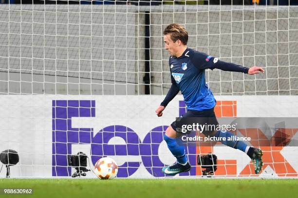 Hoffenheim's Felix Passlack saves a shot on the goal line during the Europa League group C soccer match between 1899 Hoffenheim and Ludogorets...