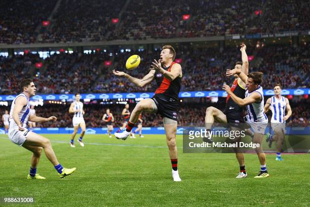 Brendon Goddard of the Bombers marks the ball during the round 15 AFL match between the Essendon Bombers and the North Melbourne Kangaroos at Etihad...