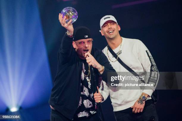 Music producer Raf Camora receives the award as 'Best Hip Hop Act' at the award ceremony of the '1Live Krone' award at the Jahrhunderthalle event...