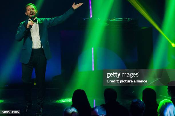 Klaas Heufer-Umlauf sings at the award ceremony of the '1Live Krone' award at the Jahrhunderthalle event hall in Bochum, Germany, 7 December 2017....