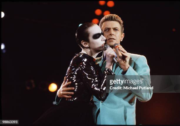 British singers Annie Lennox and David Bowie performing a duet at the Freddie Mercury Tribute Concert for AIDS Awareness, Wembley Stadium, London,...