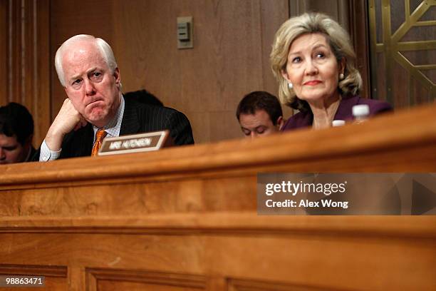 Sen. John Cornyn and Sen. Kay Bailey Hutchison listen during a hearing before the Senate Caucus on International Narcotics Control May 5, 2010 on...