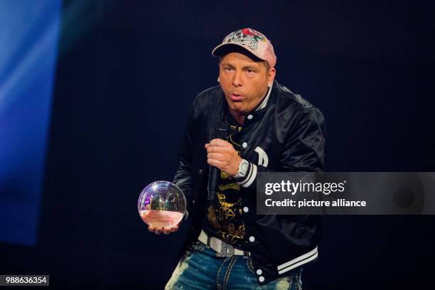 Comedian Dennis aus Huerth receives the award in the category 'Comedy' at the award ceremony of the '1Live Krone' award at the Jahrhunderthalle event...