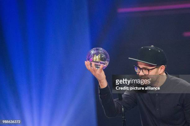 Singer Mark Forster receives the award in the category 'Best Single' at the award ceremony of the '1Live Krone' award at the Jahrhunderthalle event...