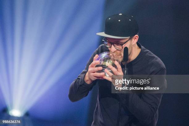 Singer Mark Forster receives the award in the category 'Best Single' at the award ceremony of the '1Live Krone' award at the Jahrhunderthalle event...