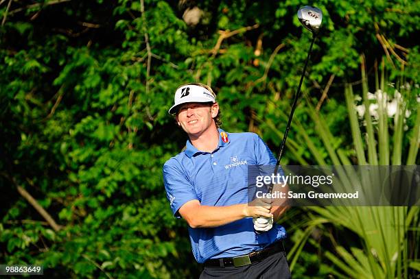 Brandt Snedeker watches his shot during a practice round prior to the start of THE PLAYERS Championship held at THE PLAYERS Stadium course at TPC...