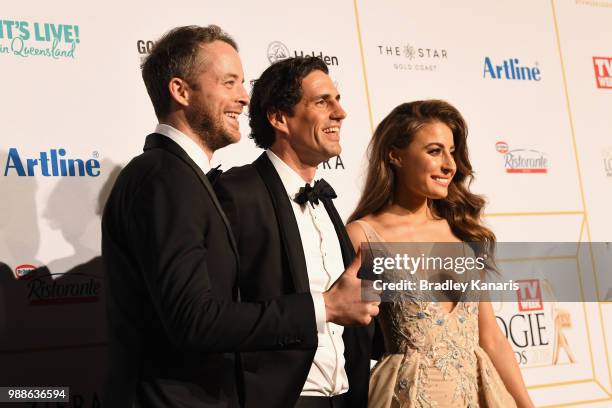 Hamish Blake, Andy Lee and Rebecca Harding arrive at the 60th Annual Logie Awards at The Star Gold Coast on July 1, 2018 in Gold Coast, Australia.