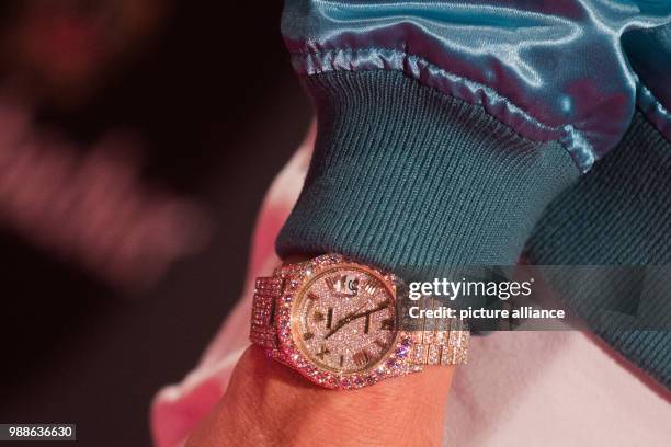 The diamond Rolex DayDate watch of US-American rapper Rapper Macklemore can be seen at the award ceremony of the '1Live Krone' award at the...