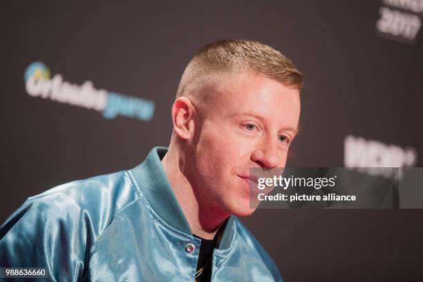 American rapper Rapper Macklemore arrives at the award ceremony of the '1Live Krone' award at the Jahrhunderthalle event hall in Bochum, Germany, 7...