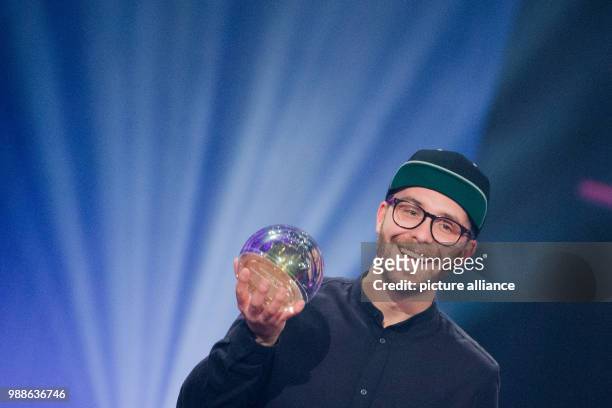 Signer Mark Forster receives the award for the 'Best single' at the award ceremony of the '1Live Krone' award at the Jahrhunderthalle event hall in...