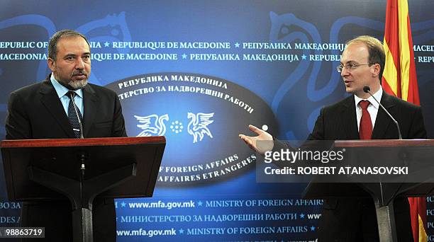 Israel's Foreign Minister Avigdor Lieberman accompanied by his Macedonian counterpart Antonio Milososki give a press conference in Skopje on May 3,...