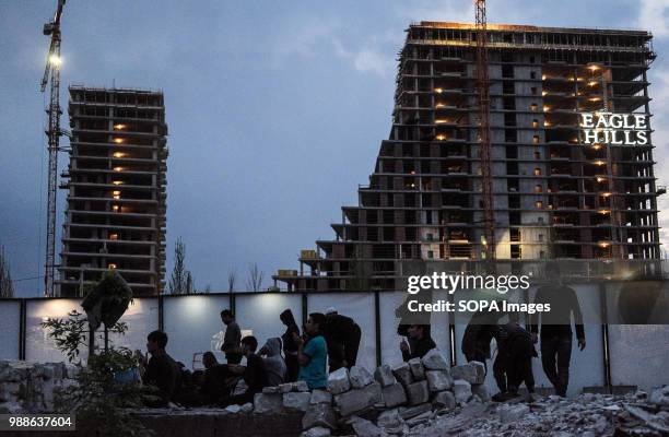 Refugees and migrants pray at a make shift mosque at the Barracks. The Barracks in Belgrade were abandoned buildings behind the central train station...